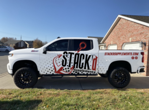 Supplement store needs Truck Designed | Car Wrap Design by Azhoeck